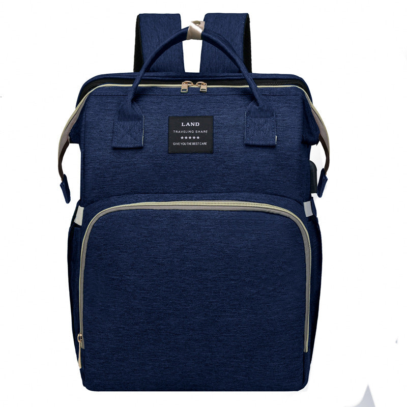travelbud diaper bag converts to travel crib fold-out demo